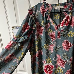 Blue floral blouse. Ruffle on sleeves